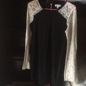 Black dress with lace detailing on sleeves